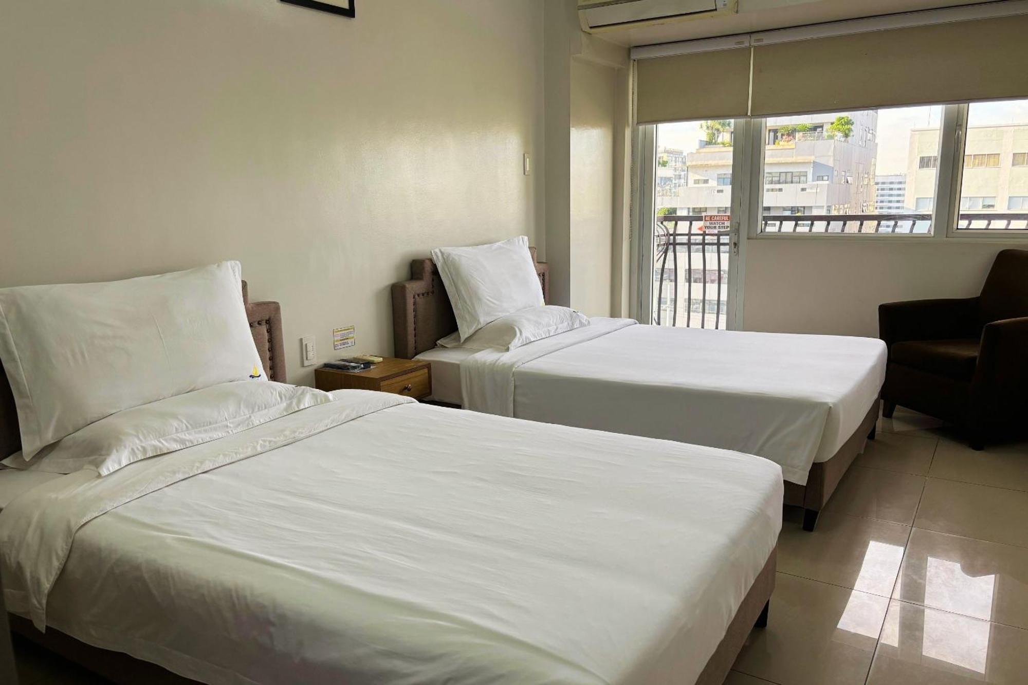 Extremeli Suites Manila Powered By Cocotel Extérieur photo