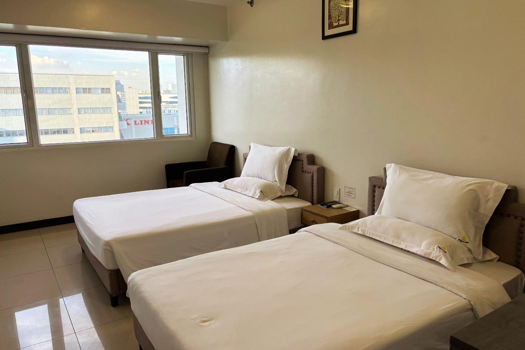 Extremeli Suites Manila Powered By Cocotel Extérieur photo