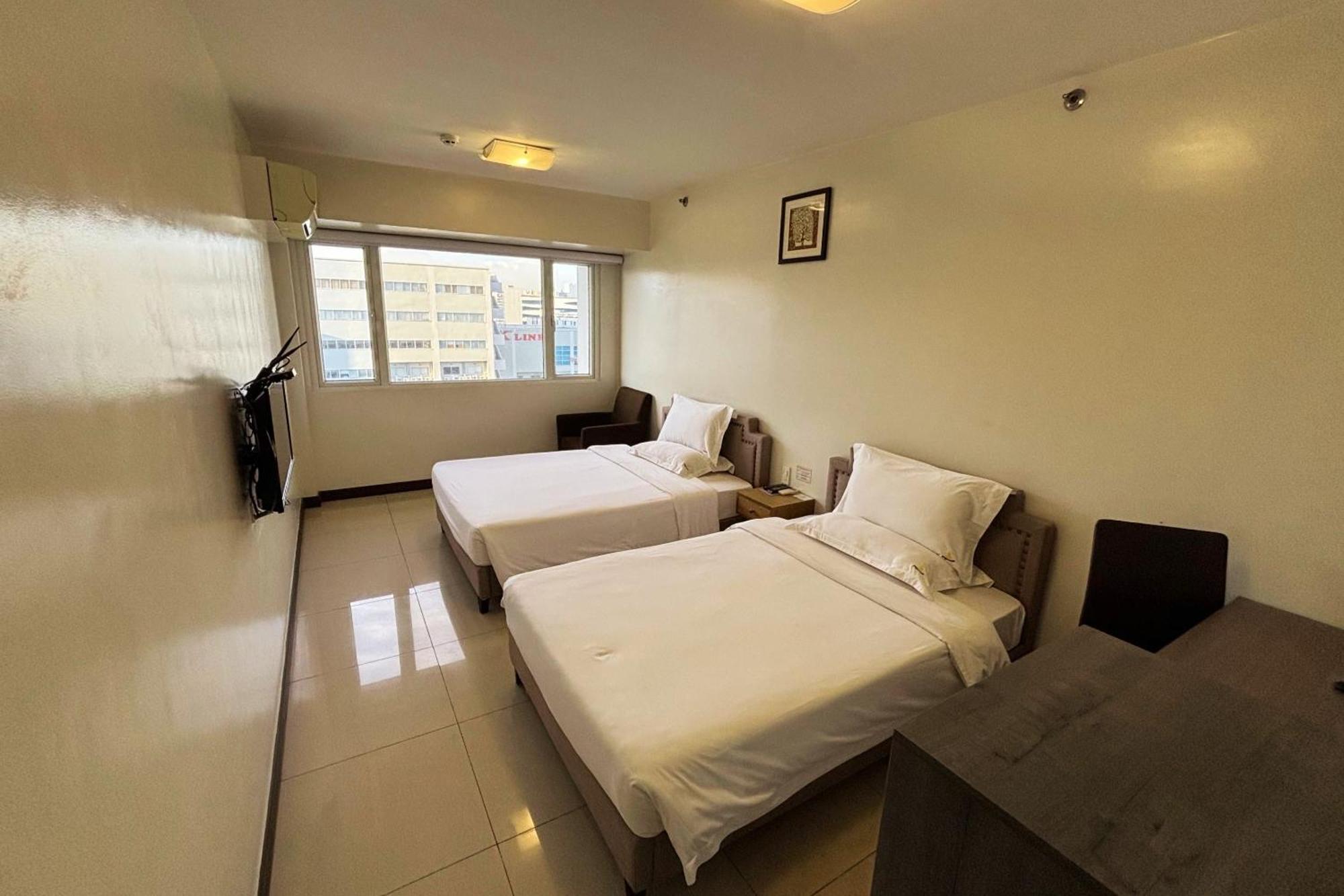 Extremeli Suites Manila Powered By Cocotel Extérieur photo