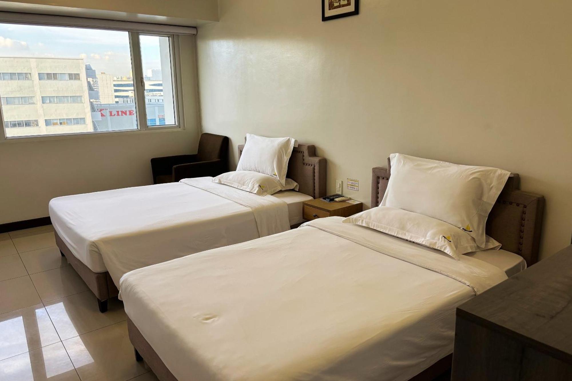 Extremeli Suites Manila Powered By Cocotel Extérieur photo